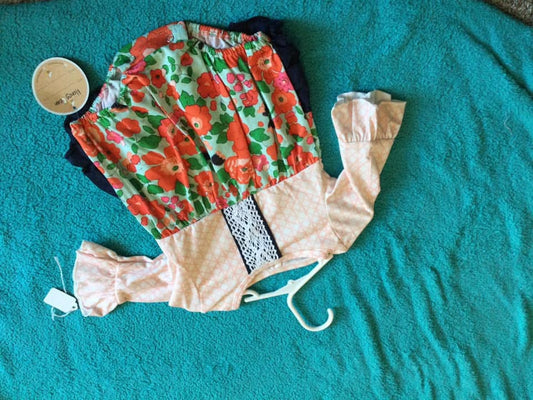 Floral navy ruffle onsie